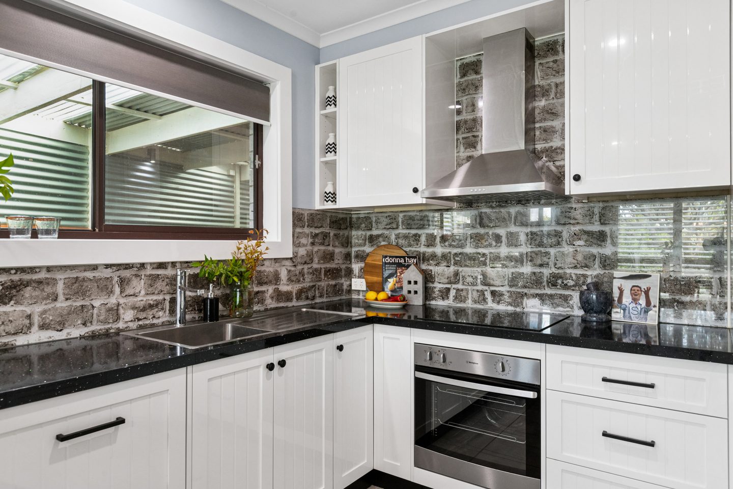 Kitchen cabinetry, oven and cooktop